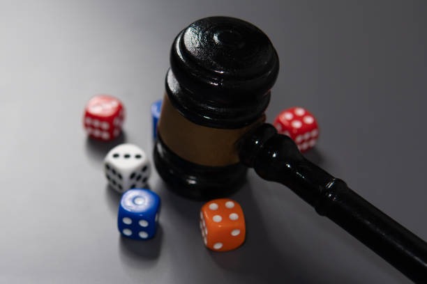 Player placing chips on Sic Bo table